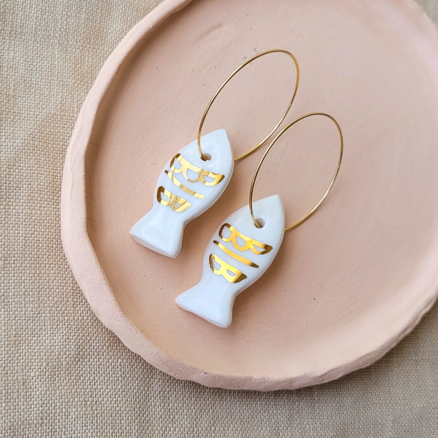 Porcelain dangle earrings with gold "White fish"