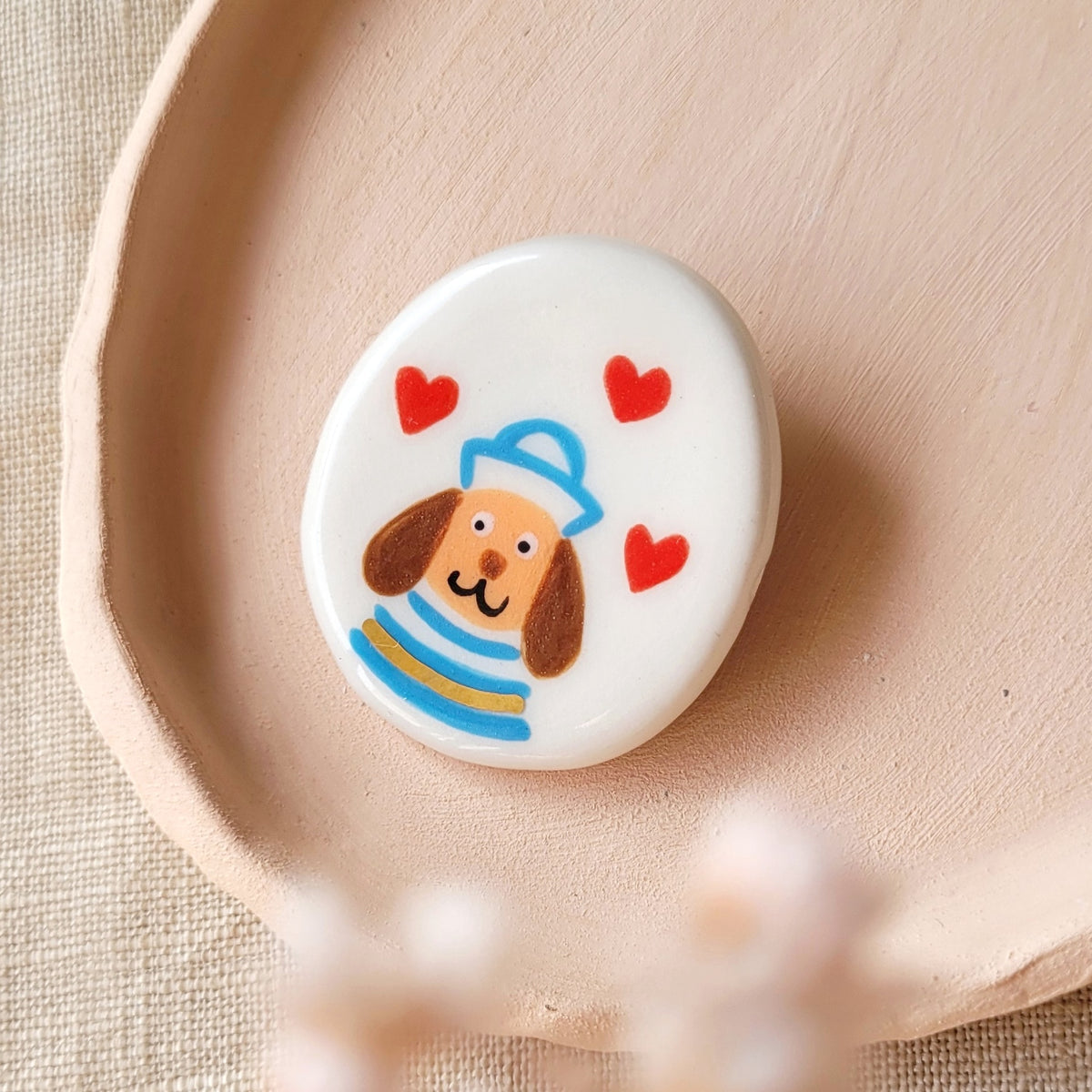 Porcelain brooch with gold "Christopher"