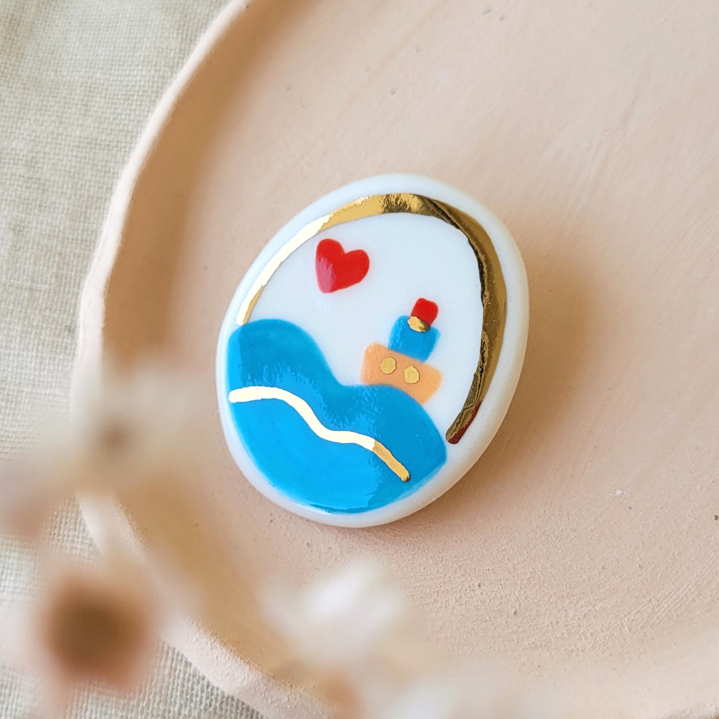 Porcelain brooch with gold "Little boat"