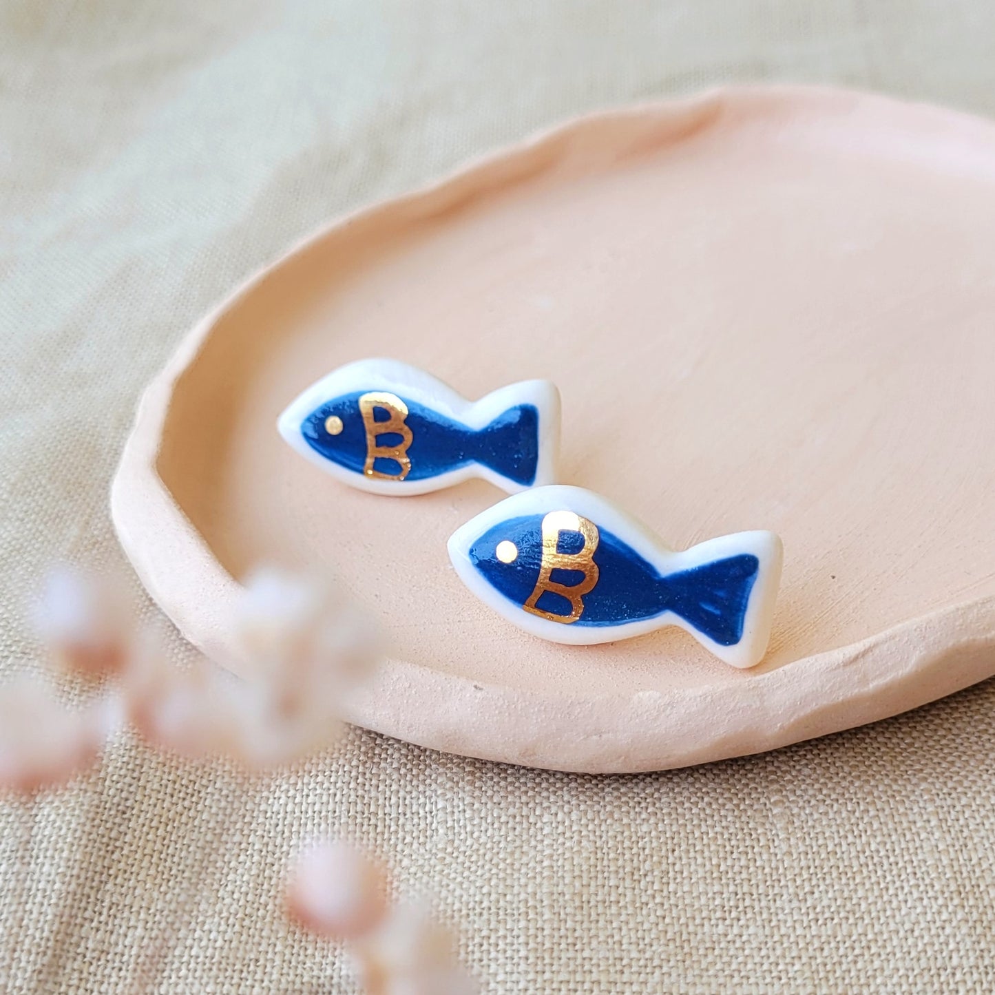 Porcelain stud earrings with gold " Dark blue fish"