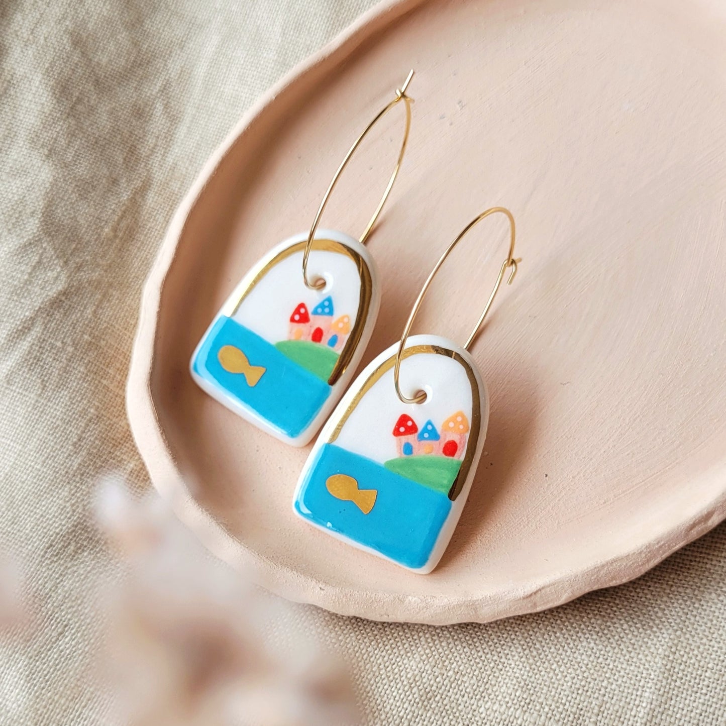 Porcelain dangle earrings with gold "My island"