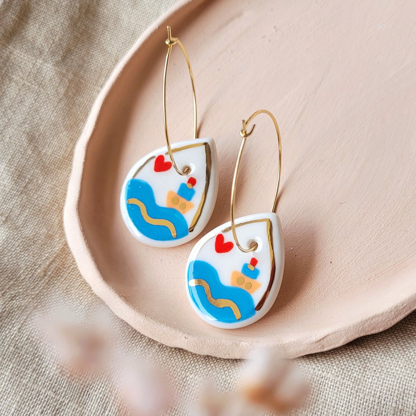 Porcelain dangle earrings with gold "Our love boat"