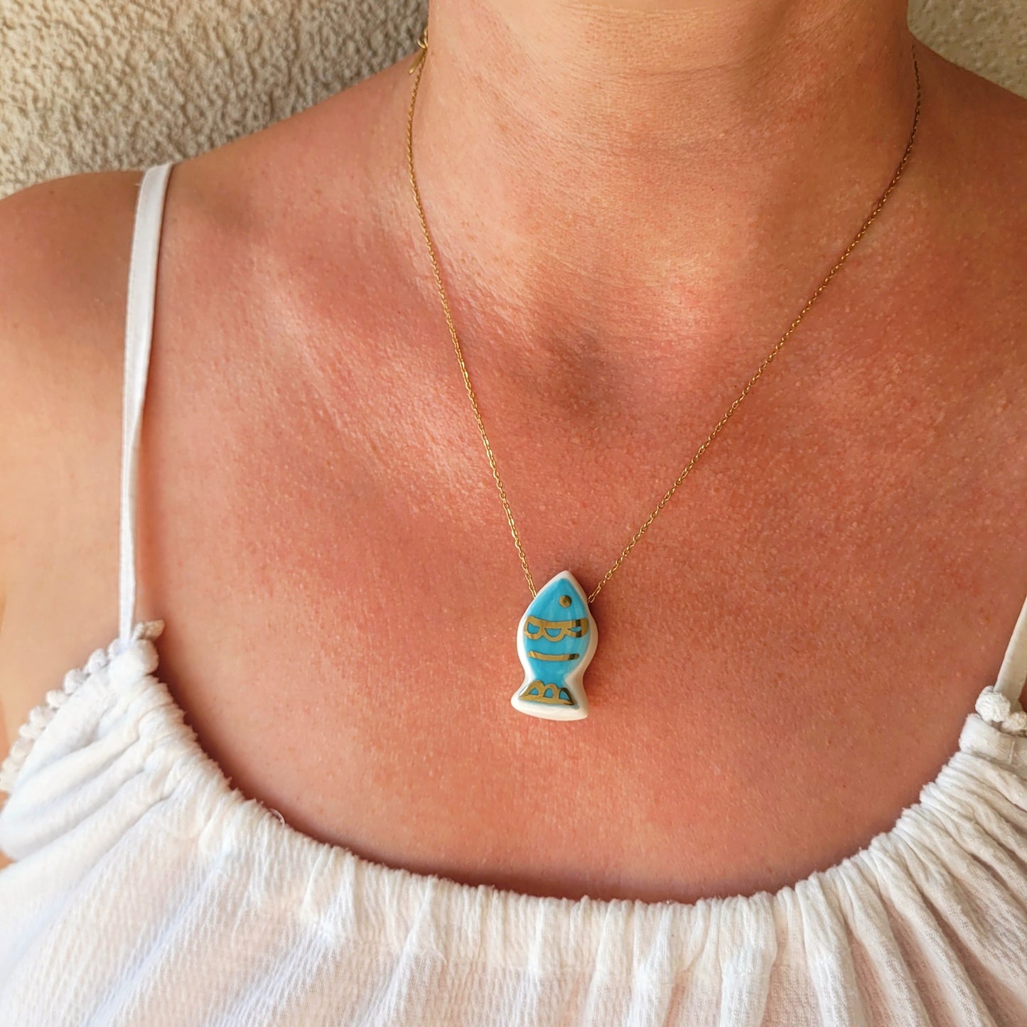 Porcelain necklace with gold "Fish"