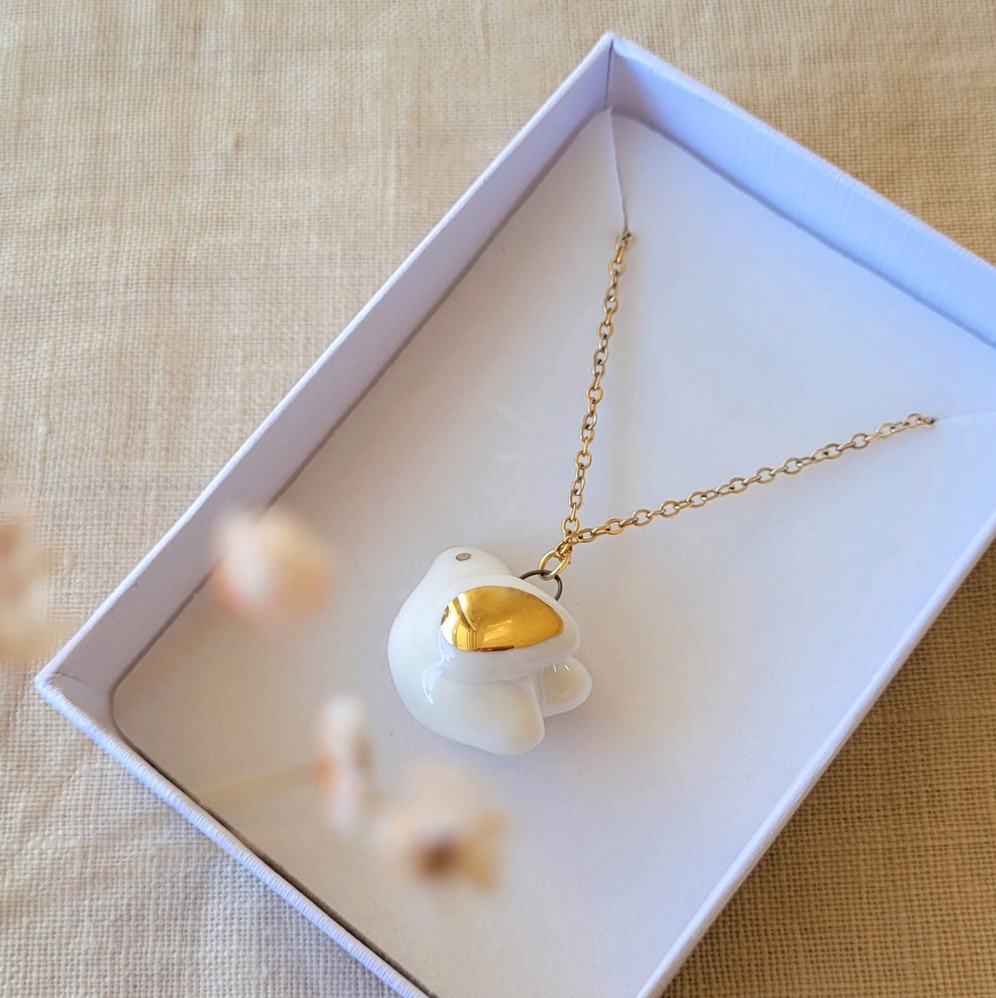 Porcelain necklace with gold "Little bird"