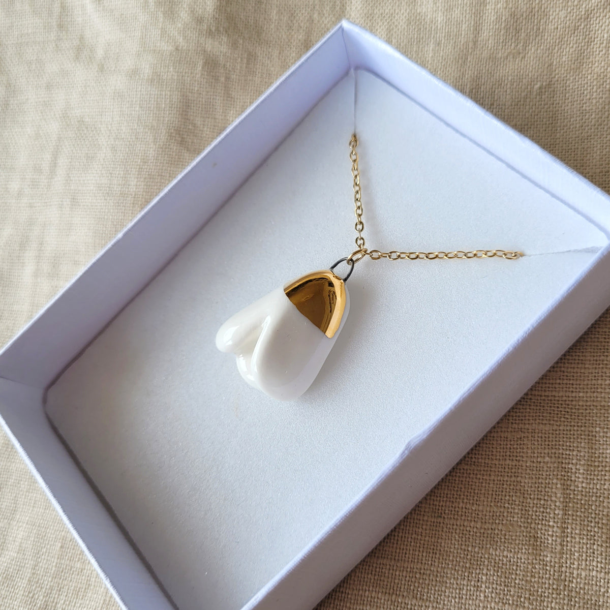 Porcelain necklace with gold "Snowdrop"