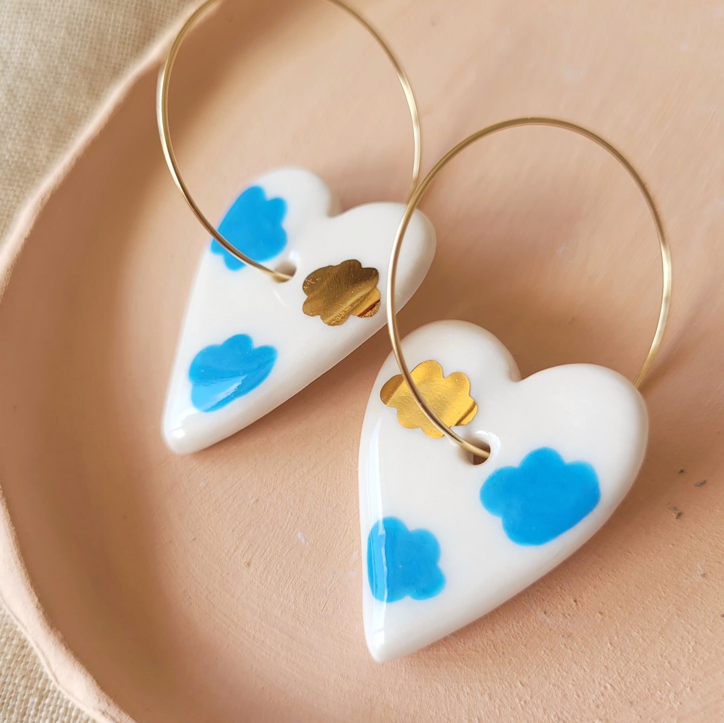 Porcelain dangle earrings with gold "Hearts with clouds"