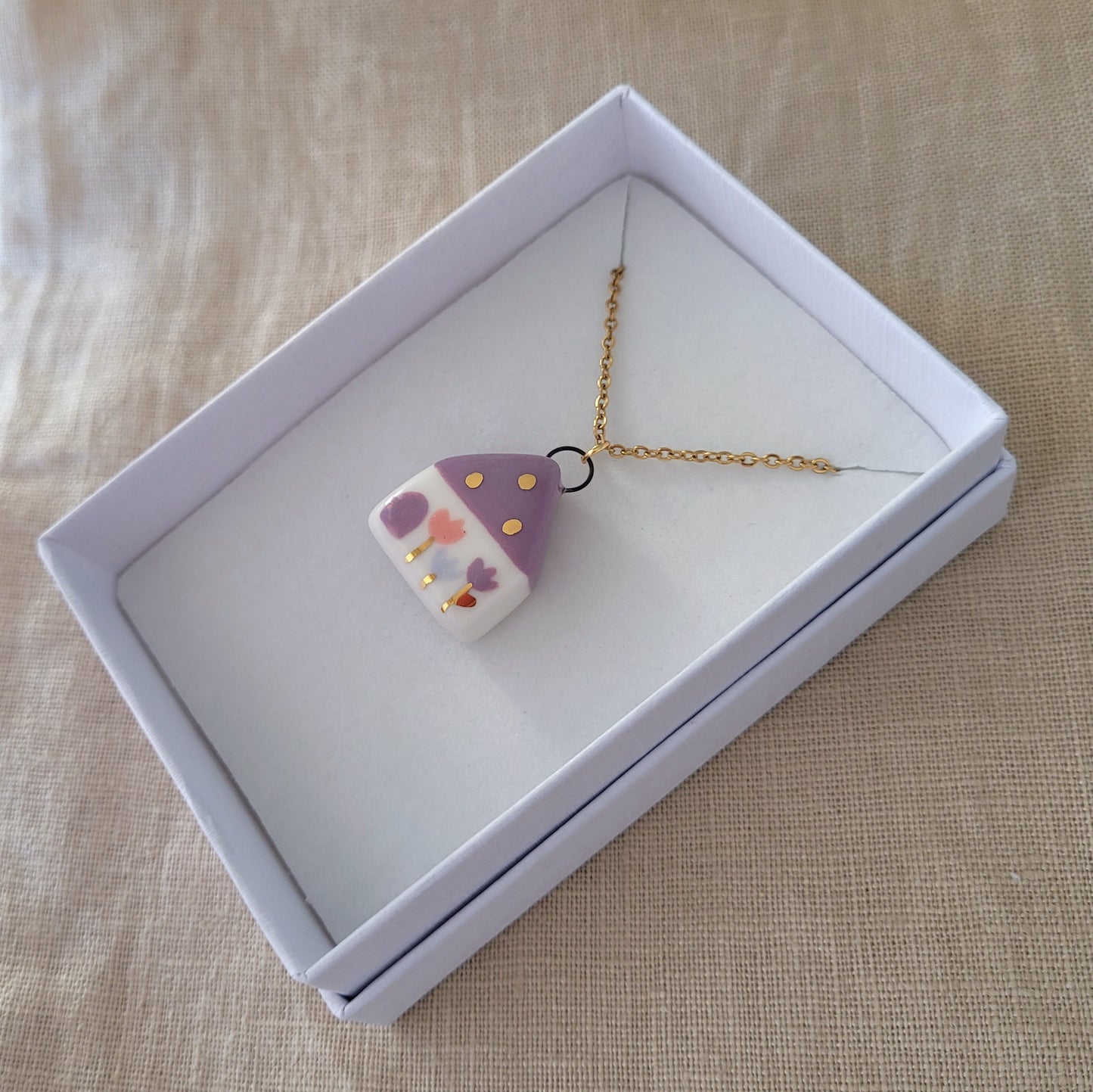 Porcelain necklace with gold "Dark pink house"