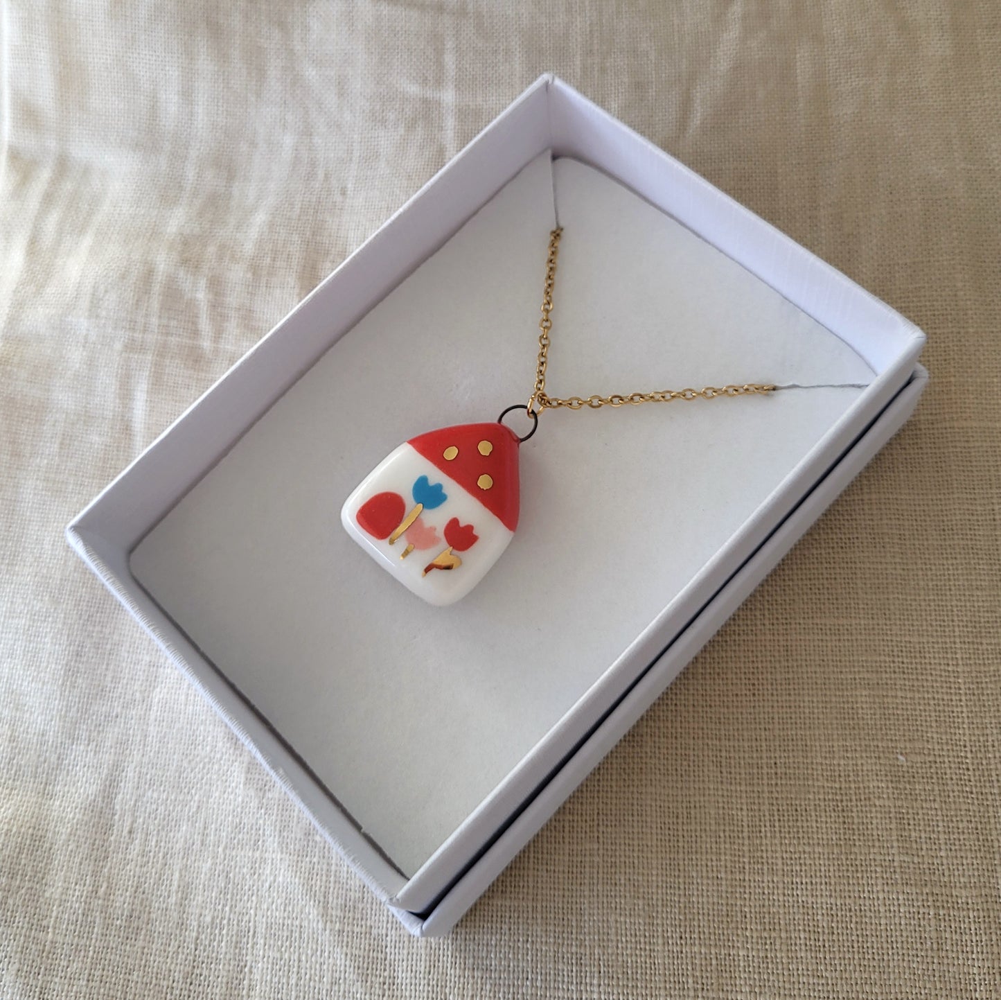 Porcelain necklace with gold "Red house with tulips"