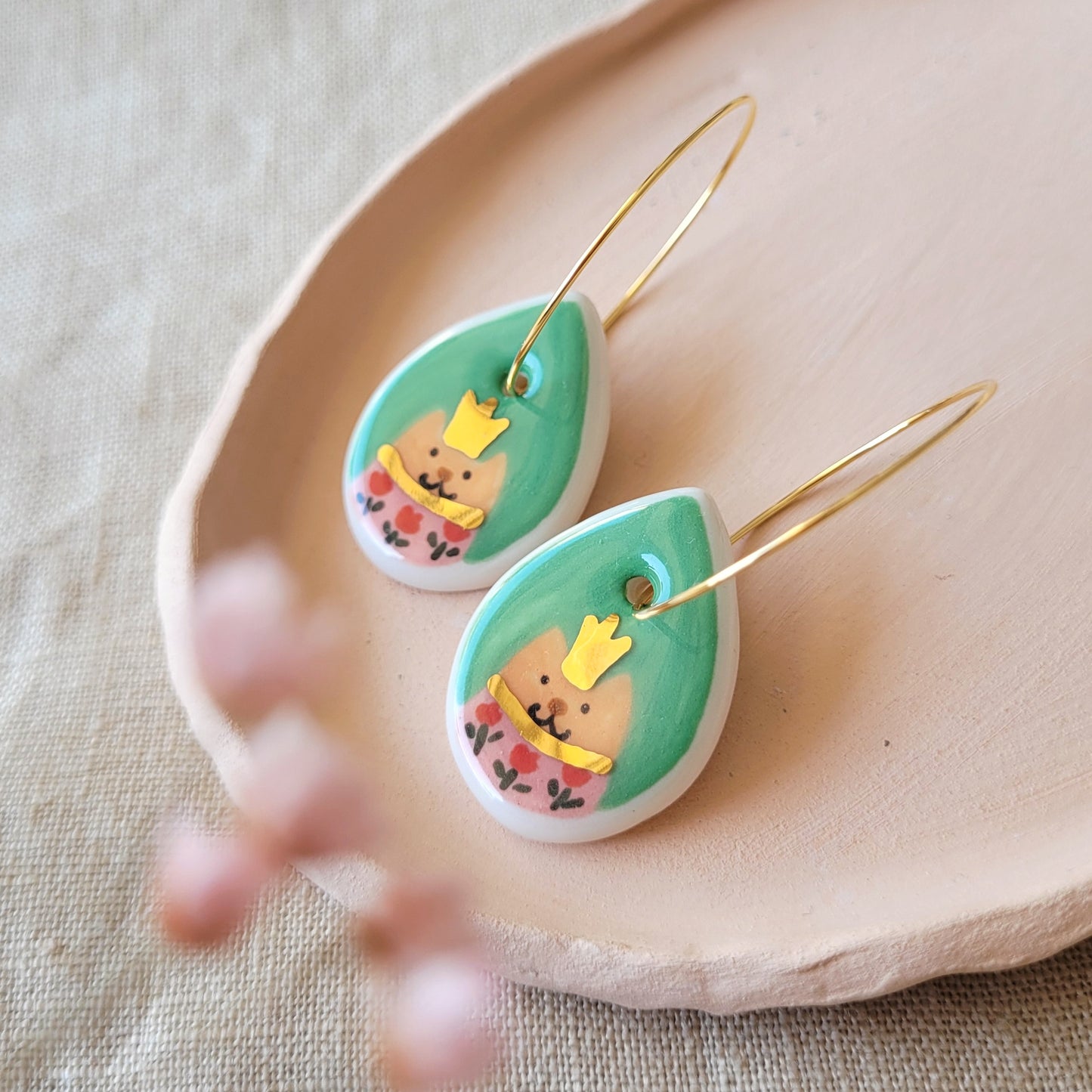 Porcelain dangle earrings with gold "Cats in green"
