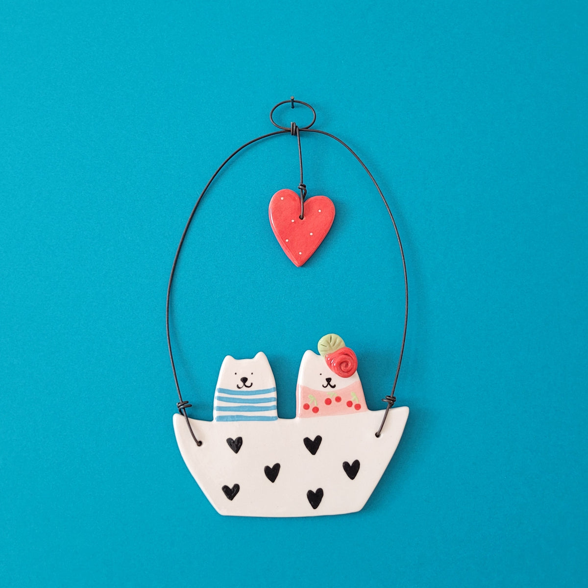 Ceramic wall hanging "Cats in a boat"