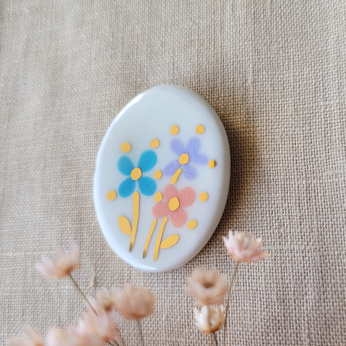Porcelain brooch with gold "Flowers with dots"