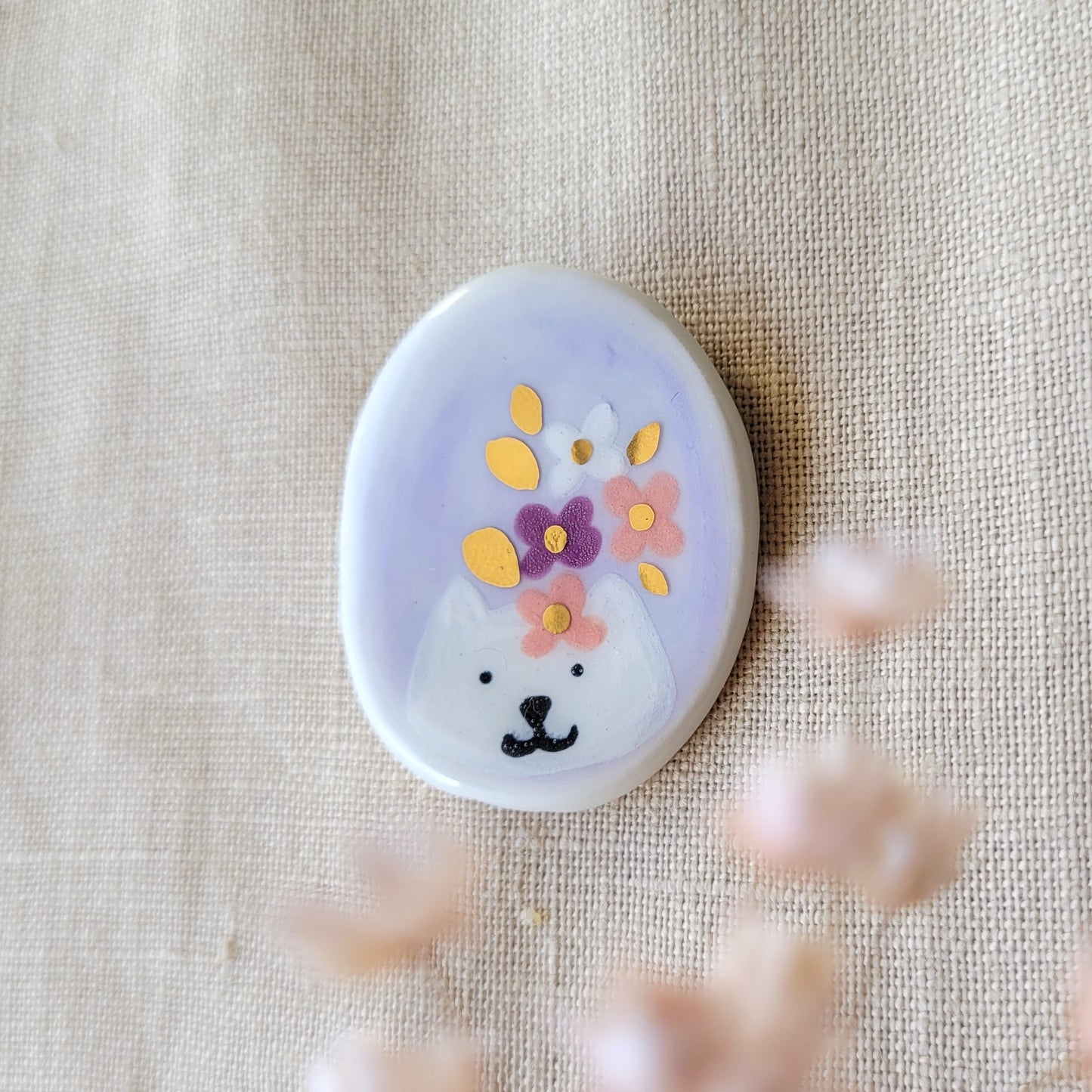 Porcelain brooch with gold "Cat with flowers"