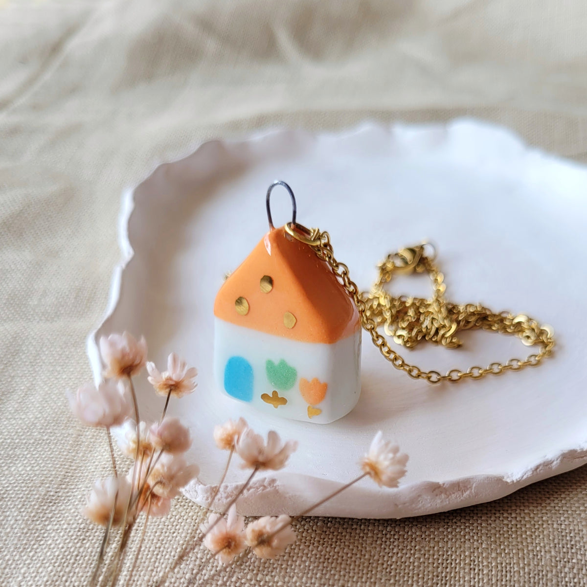 Porcelain necklace with gold "Orange house with blue door"