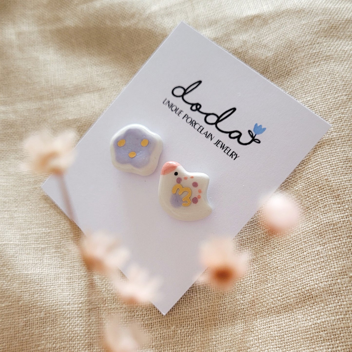 Porcelain stud earrings with gold "Little bird with purple cloud"