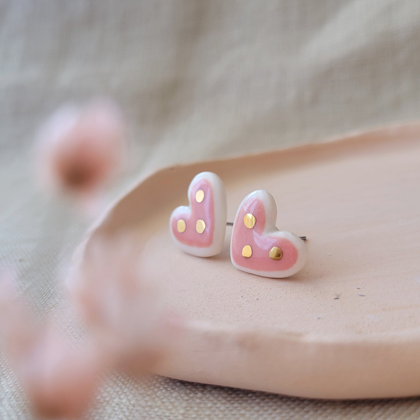 Porcelain stud earrings with gold "Pink hearts with dots"
