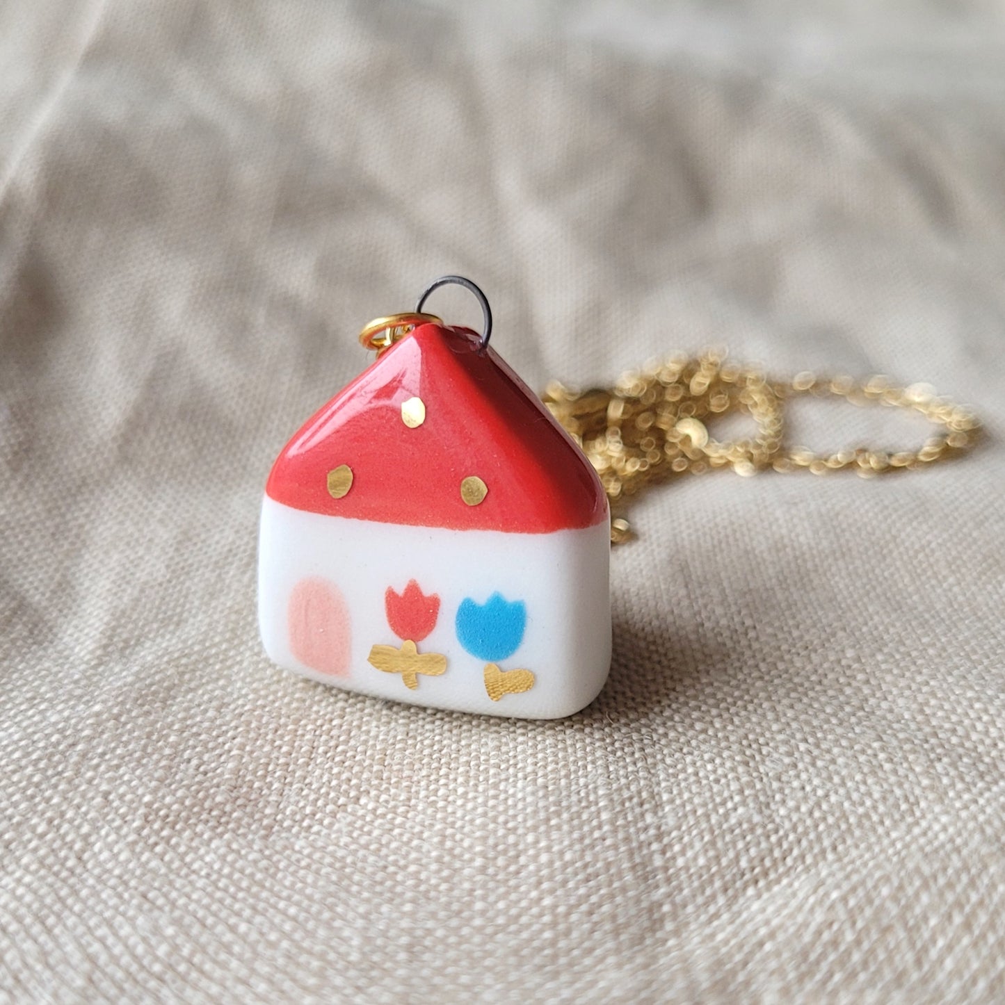 Porcelain necklace with gold "Red house with tulips"