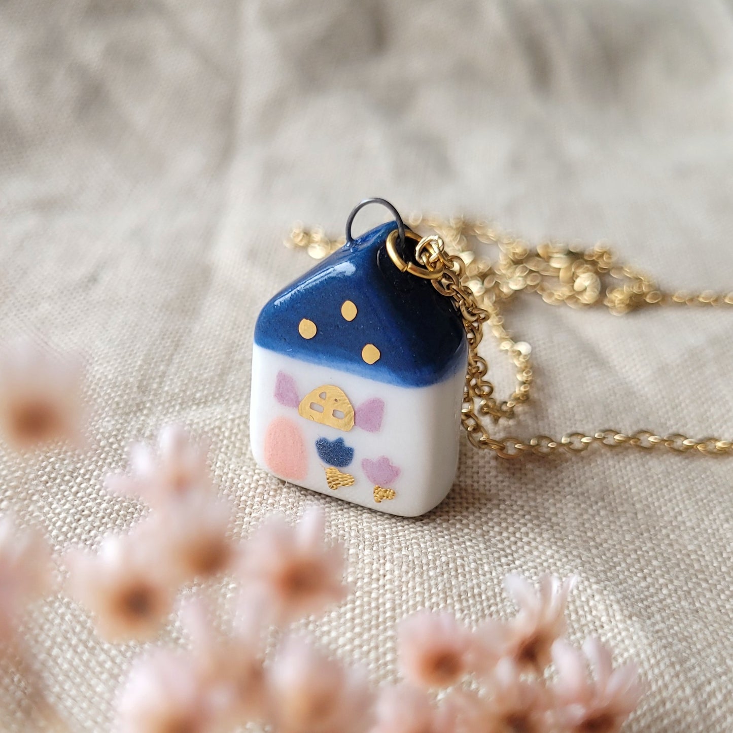 Porcelain necklace with gold "Dark blue house with purple window"