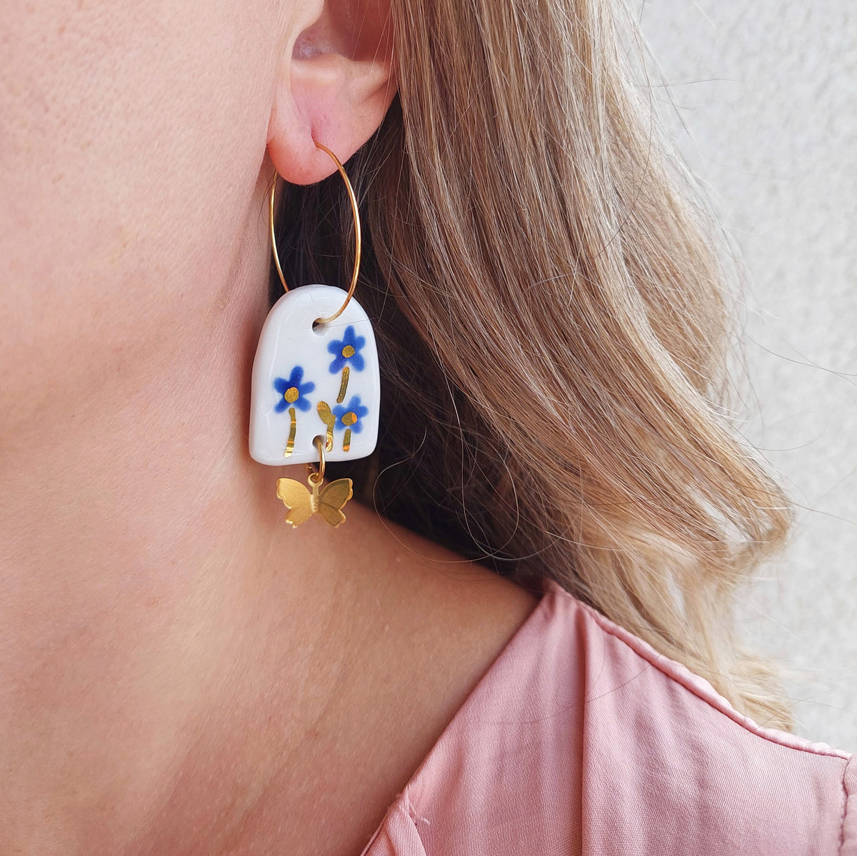 Porcelain dangle earrings with gold "Blue flowers"