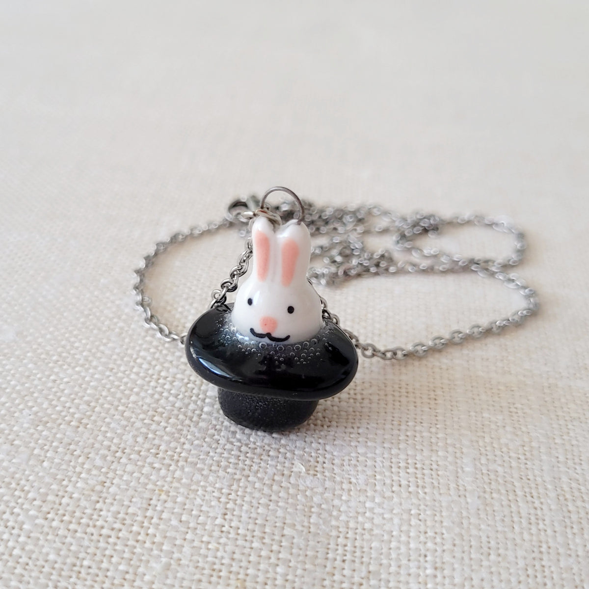 Porcelain necklace "Rabbit in a hat"