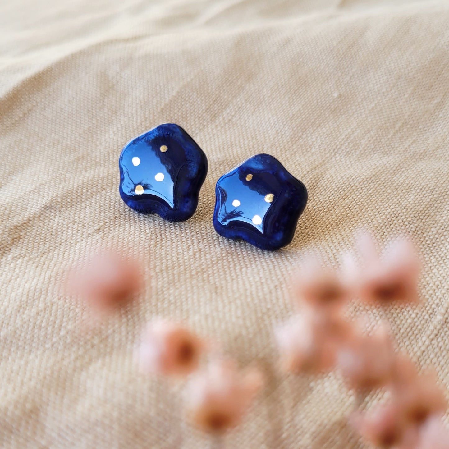 Porcelain stud earrings with gold "Tiny dark blue clouds"
