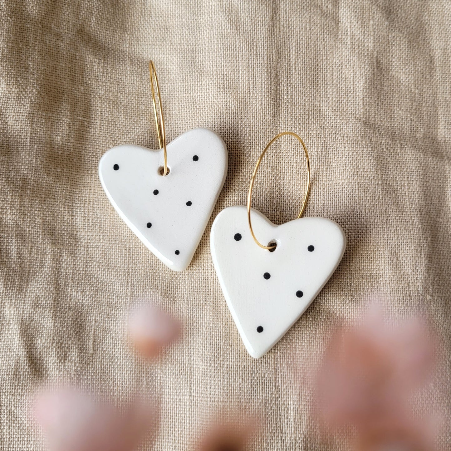 Ceramic dangle earrings "Big white hearts with black dots"