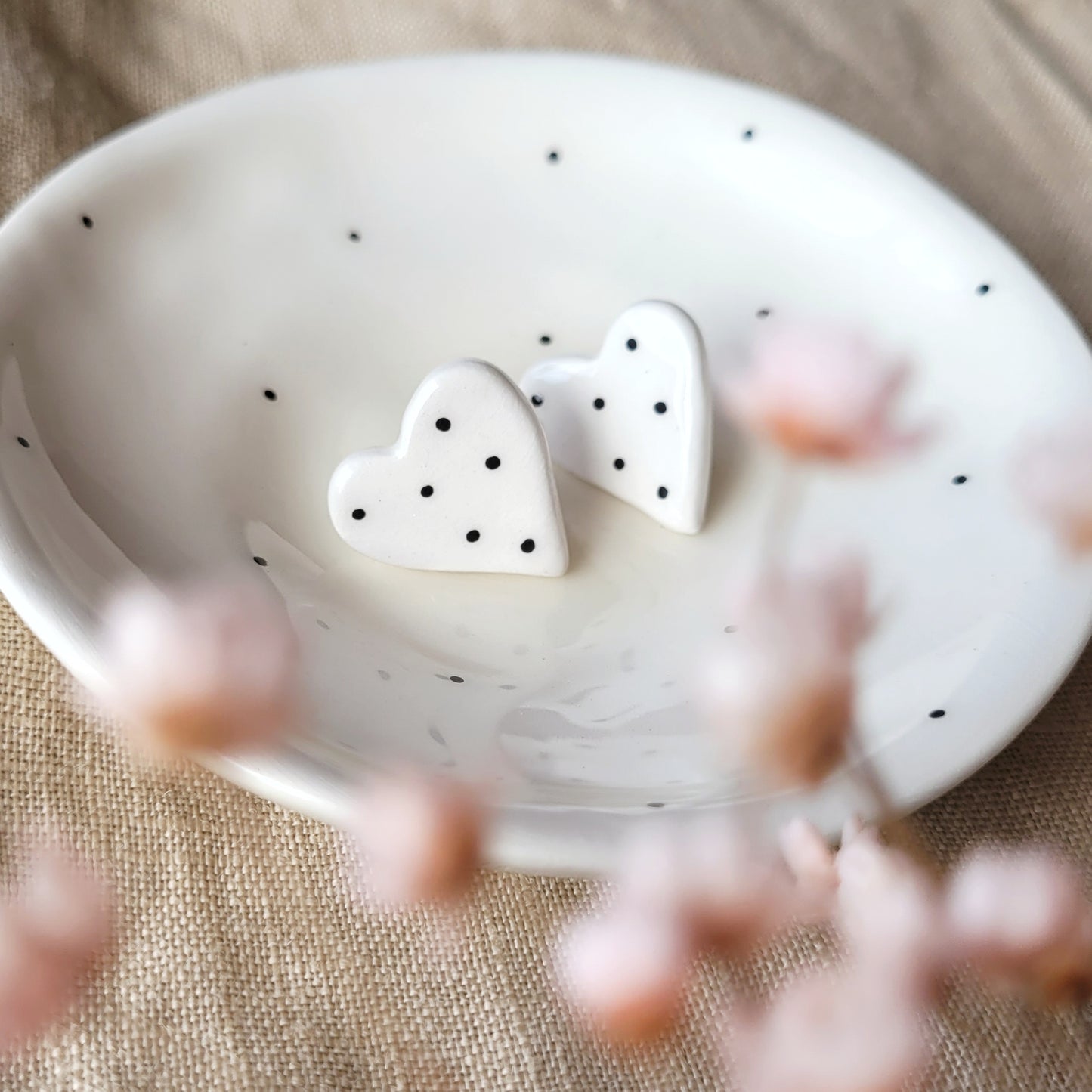 Ceramic stud earrings "White hearts with black dots"