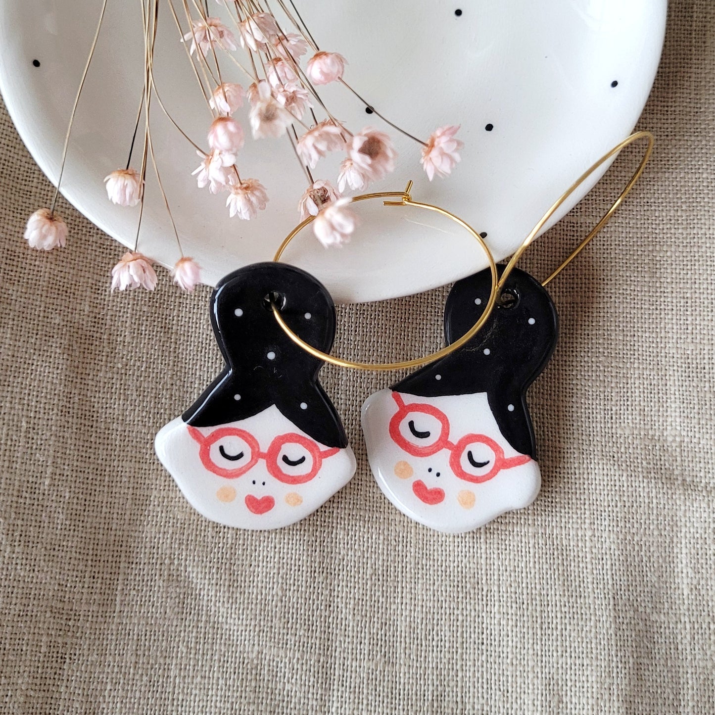 Ceramic dangle earrings "Girls with red glasses"