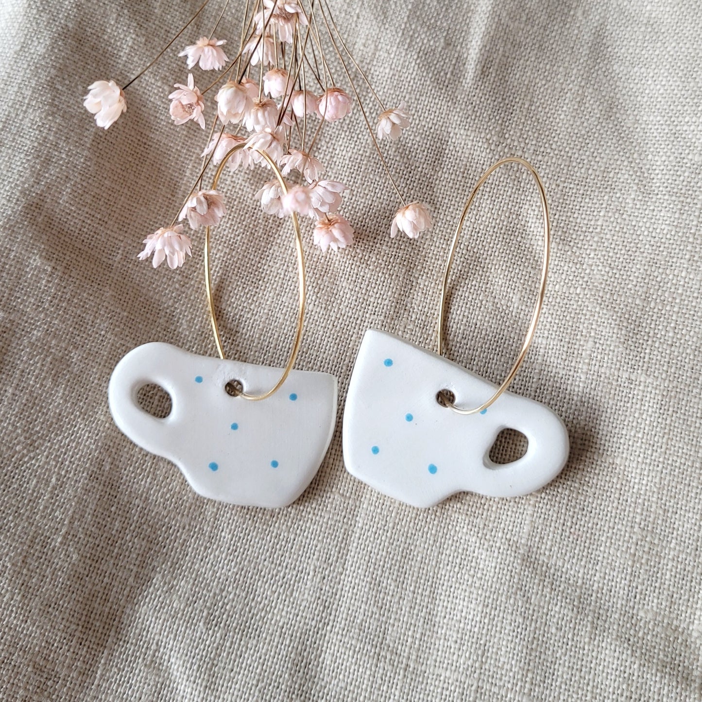 Ceramic dangle earrings "White coffee mugs with blue dots"