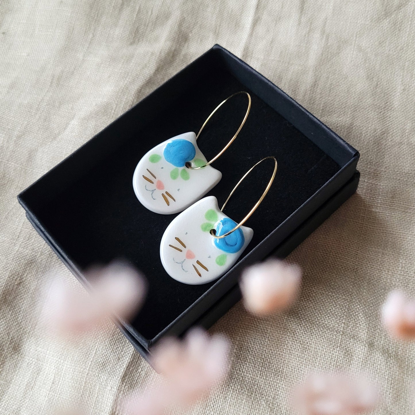 Porcelain dangle earrings with gold "Cats with blue flowers"