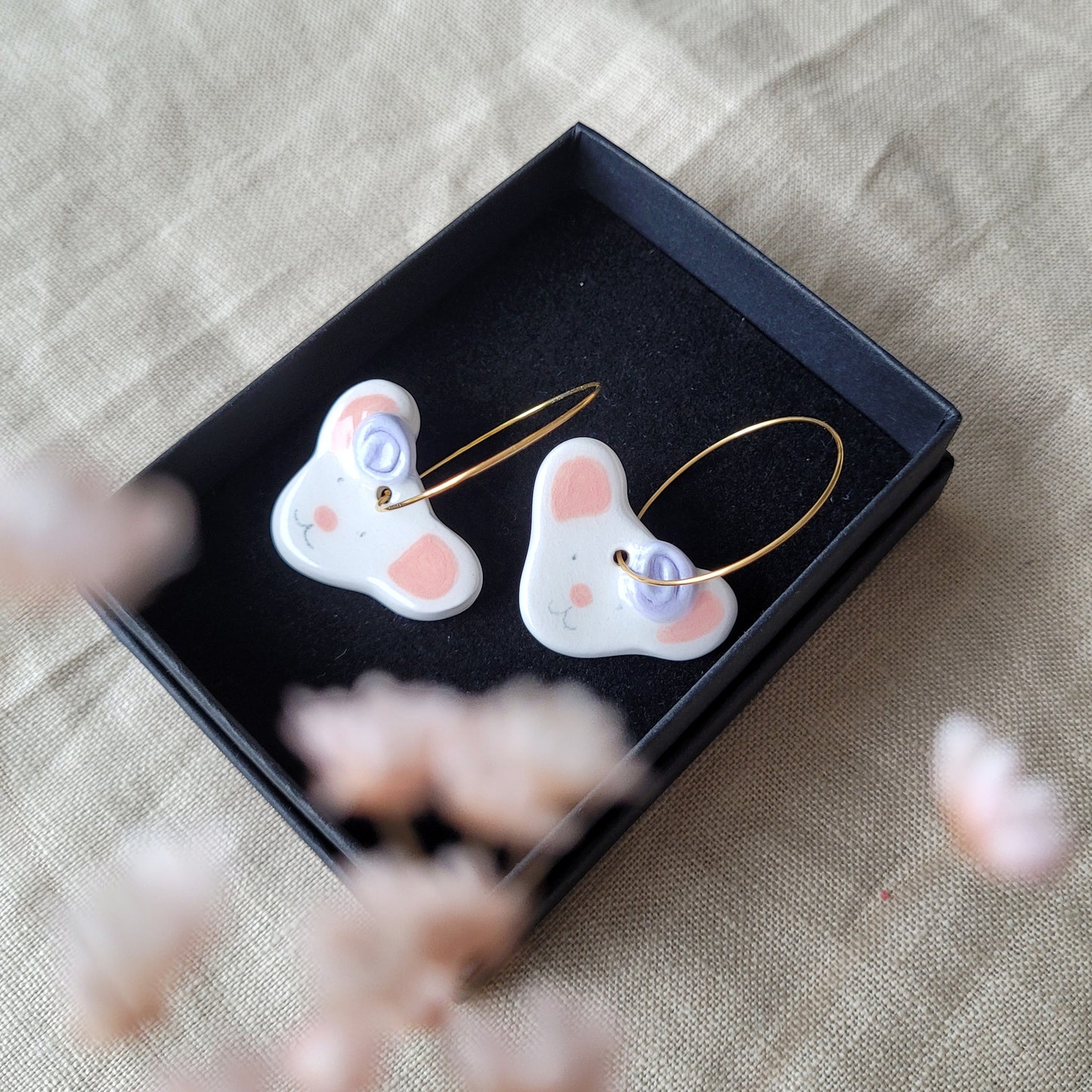 Porcelain dangle earrings "Mices with purple flowers"