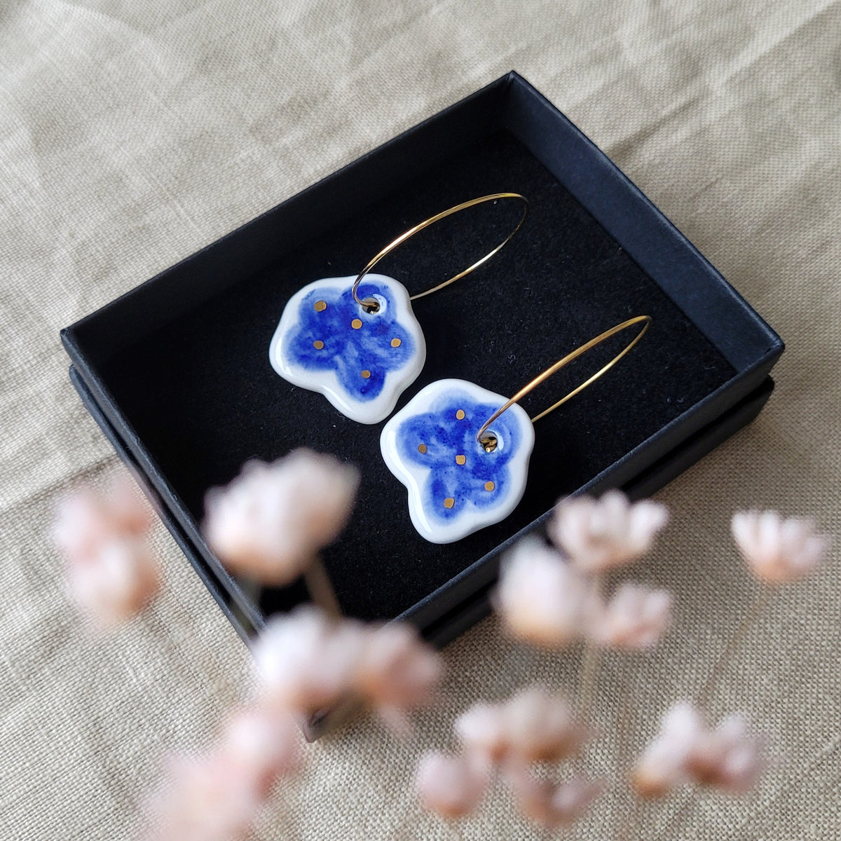 Porcelain dangle earrings with gold "Dark blue clouds"