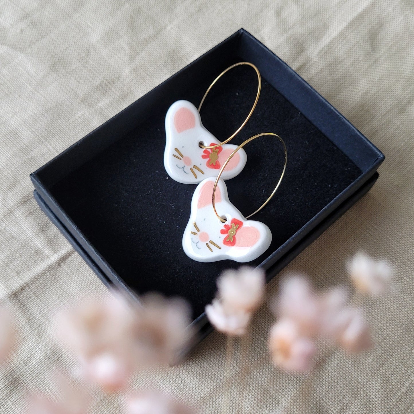 Porcelain dangle earrings with gold "Mices with bows"