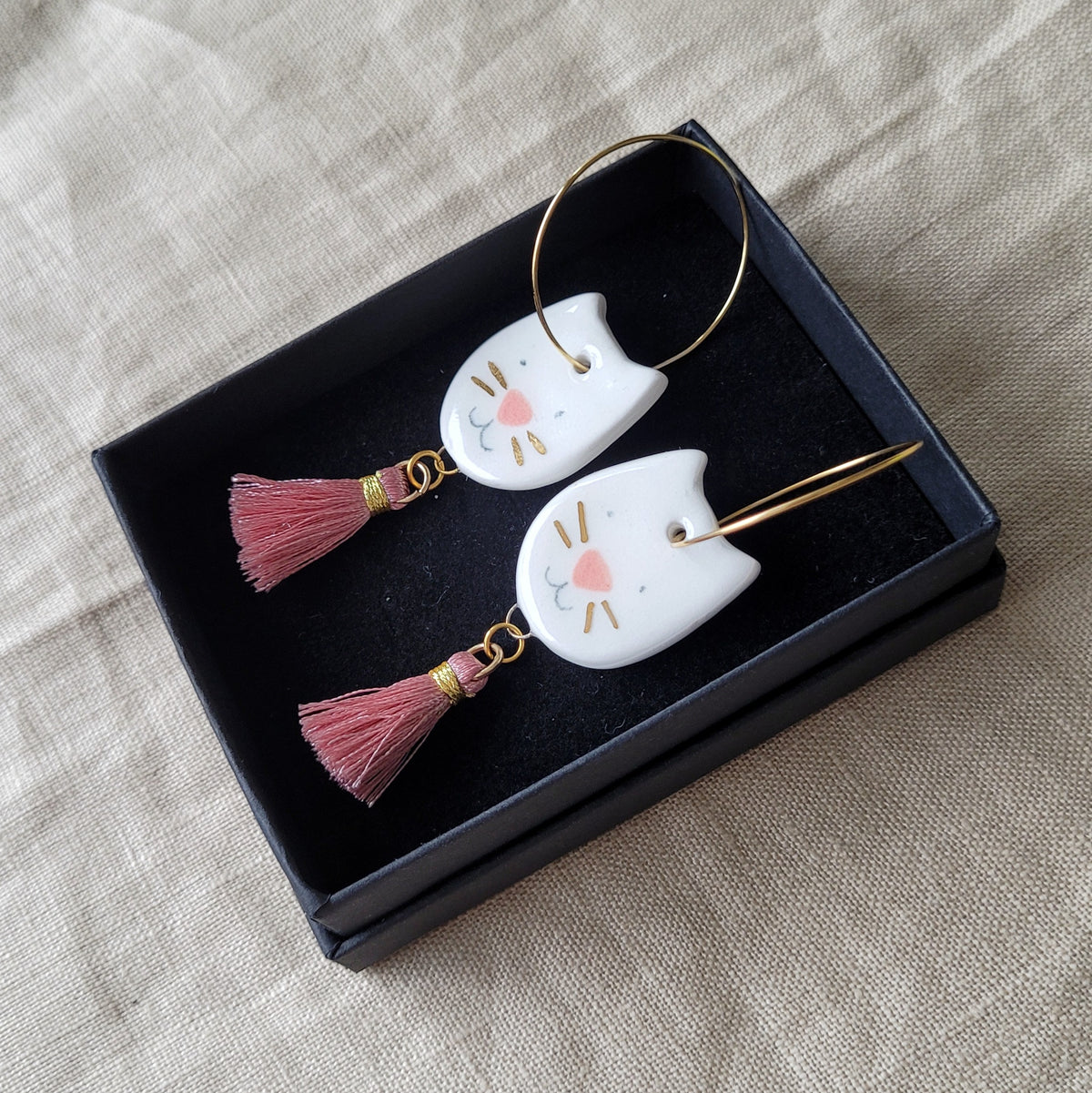 Porcelain dangle earrings with gold "Cats with gold mustaches"