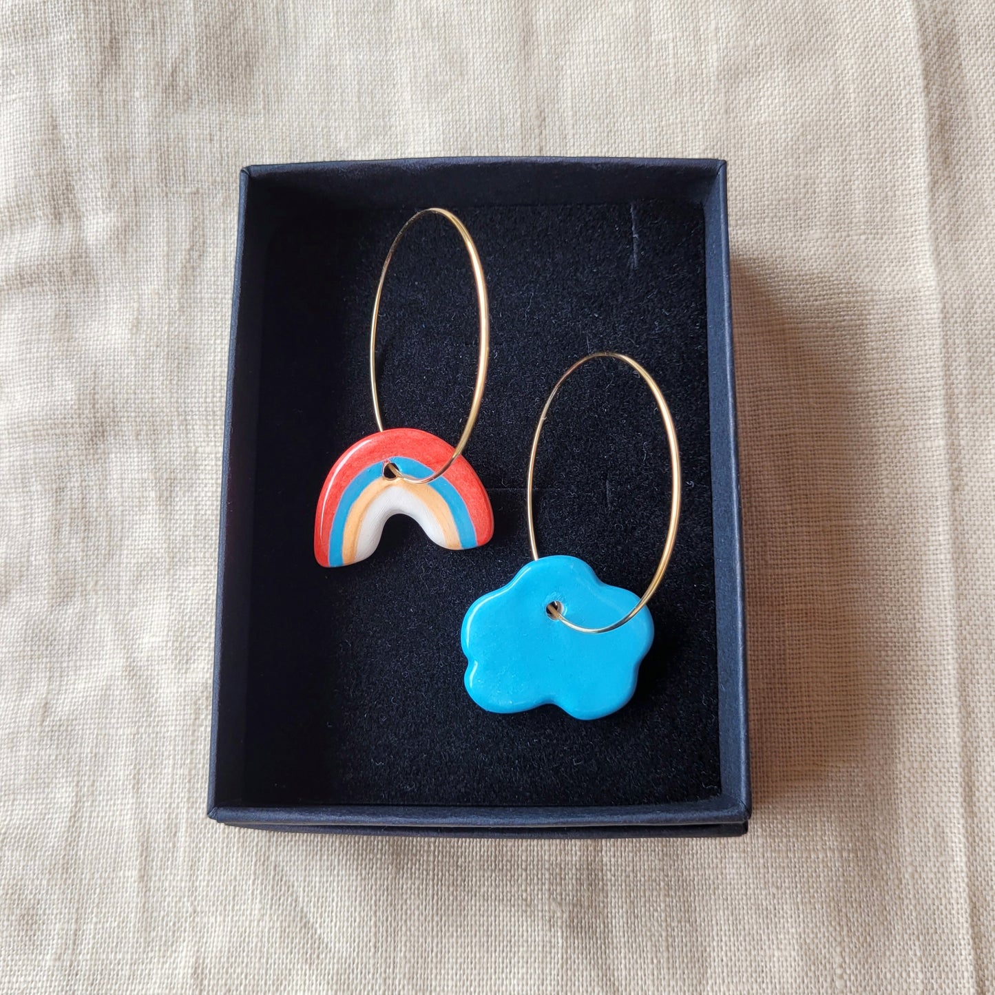 Ceramic mismatched dangle earrings "Cloud and rainbow"