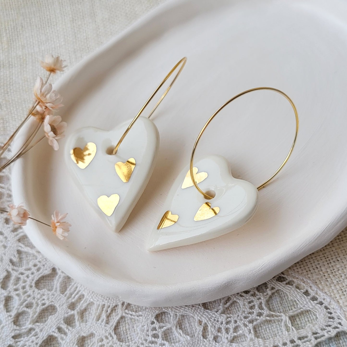 Porcelain dangle earrings with gold "Hearts with hearts"