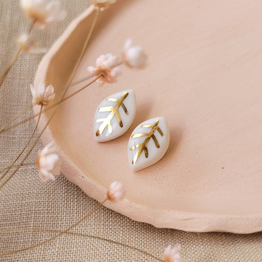 Porcelain stud earrings with gold "Tiny white leaves"