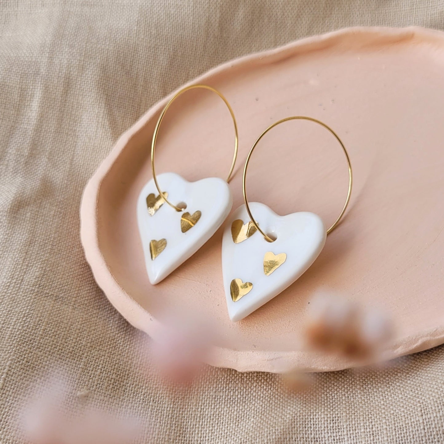 Porcelain dangle earrings with gold "Hearts with hearts"