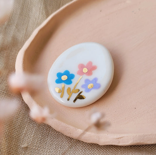Porcelain brooch with gold "Flowers"