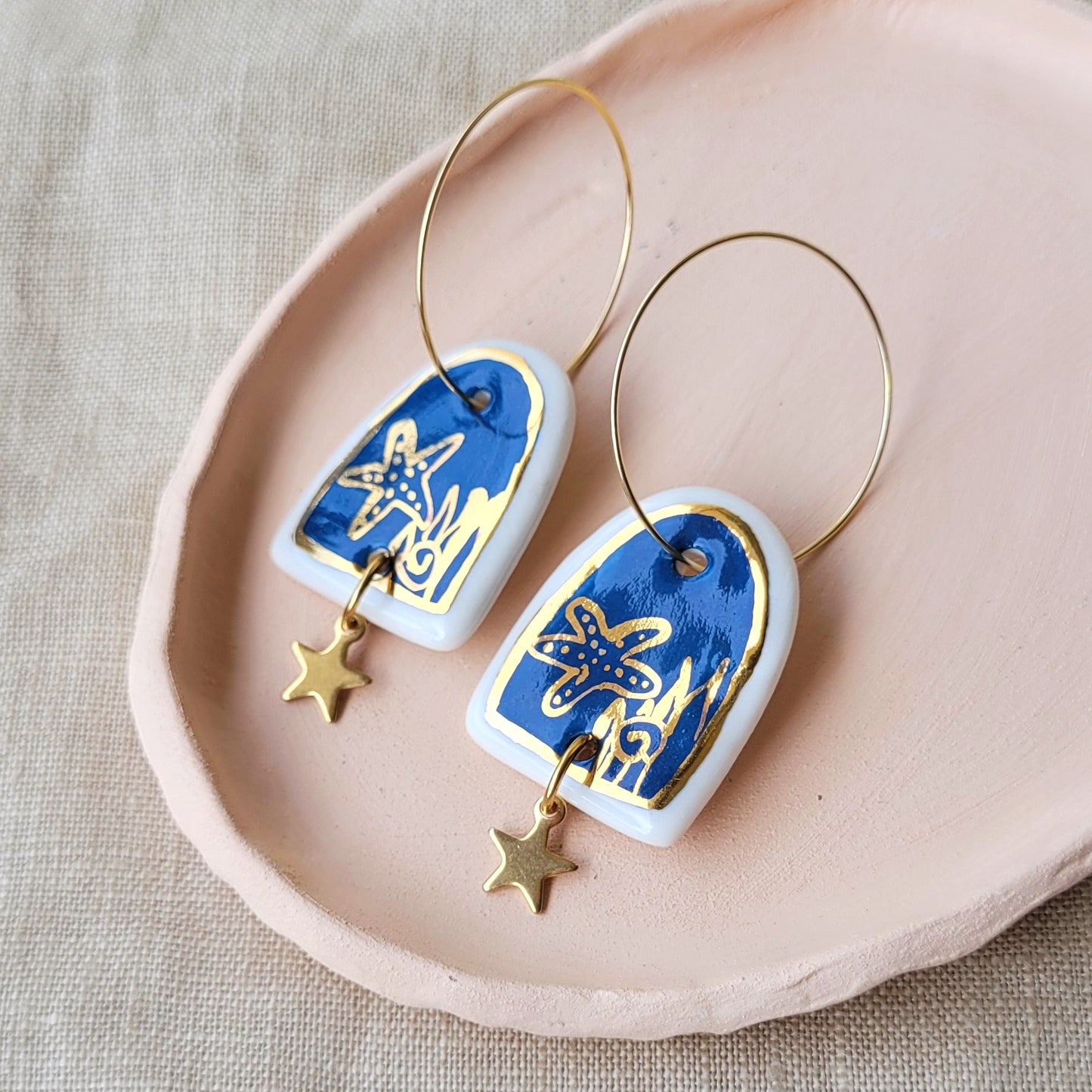 Porcelain dangle earrings with gold "Deep blue sea"
