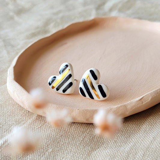 Porcelain stud earrings with gold "Hearts with black stripes"