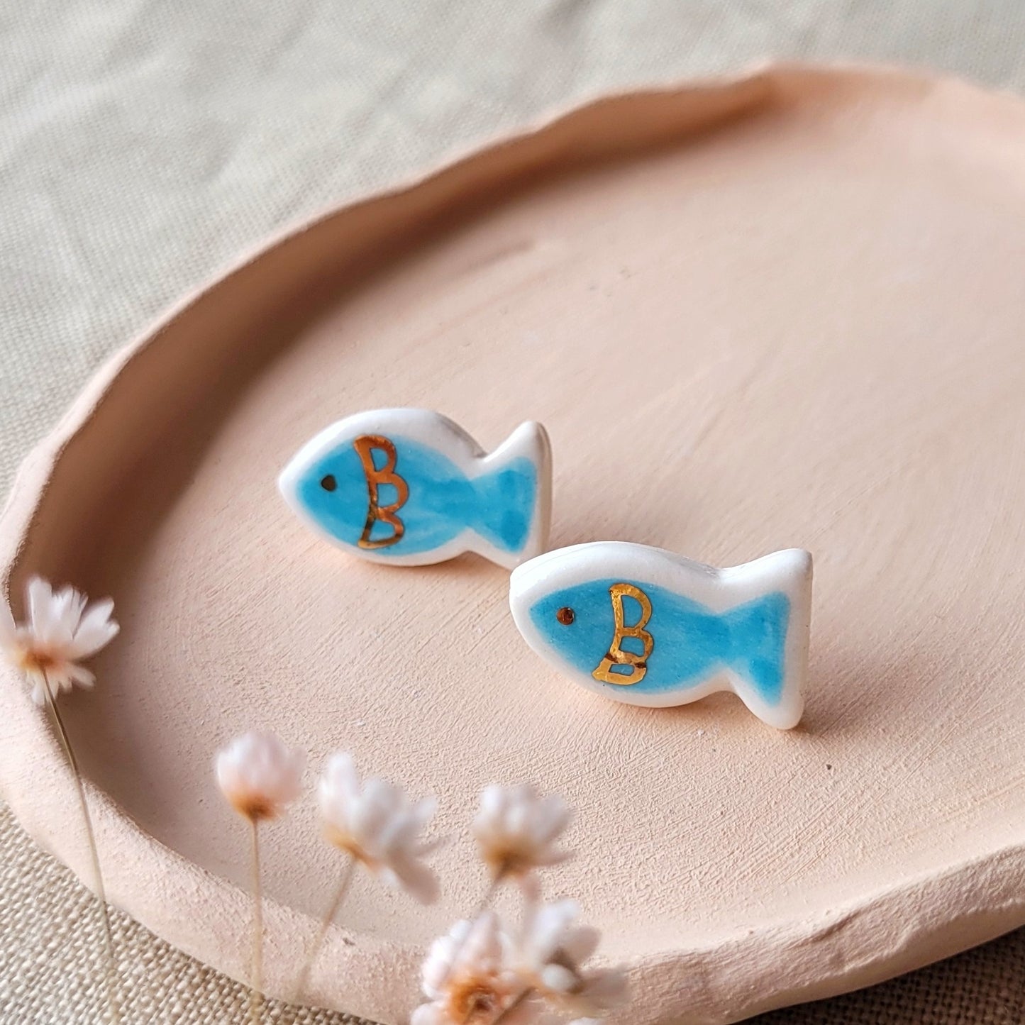Porcelain stud earrings with gold " Light blue fish"
