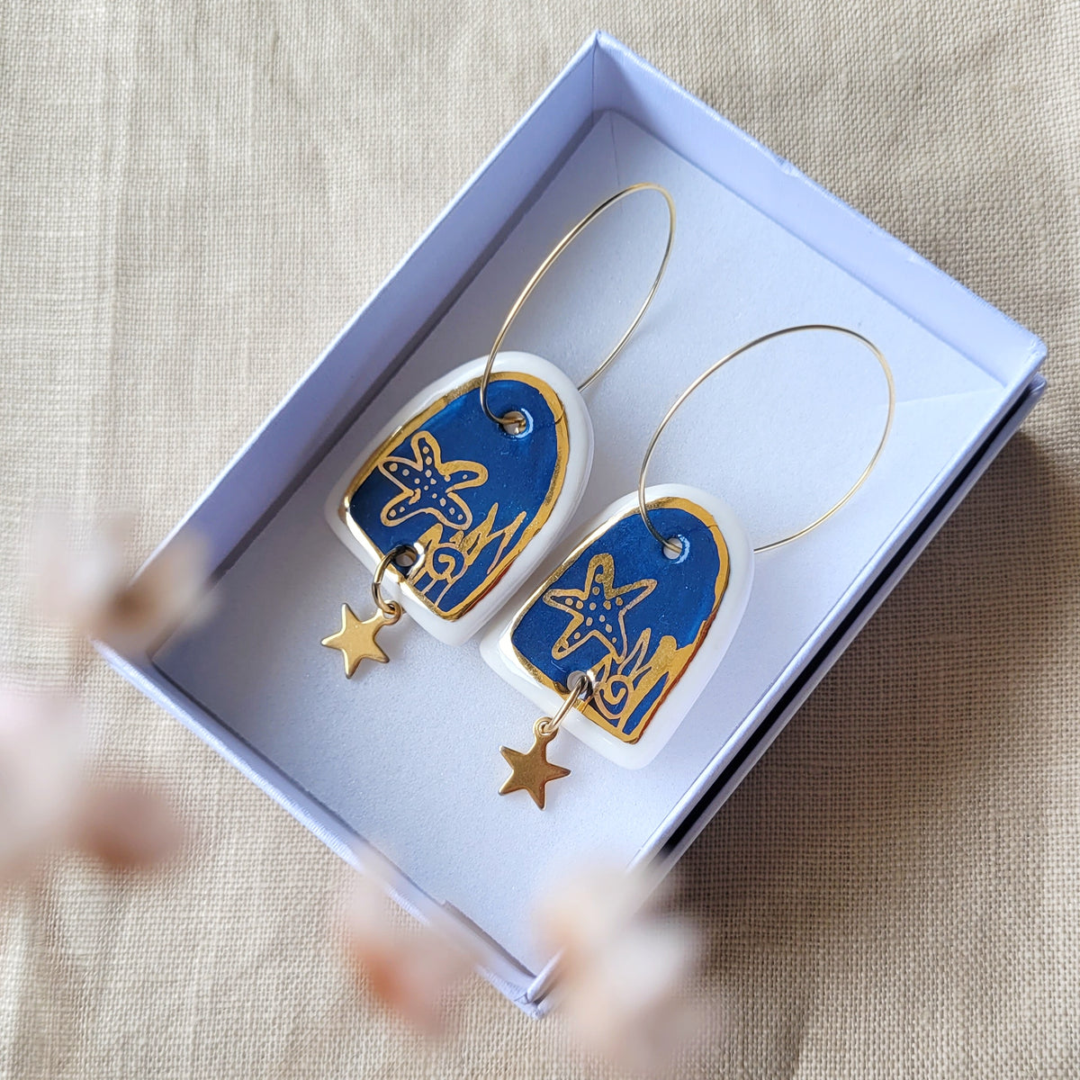Porcelain dangle earrings with gold "Deep blue sea"