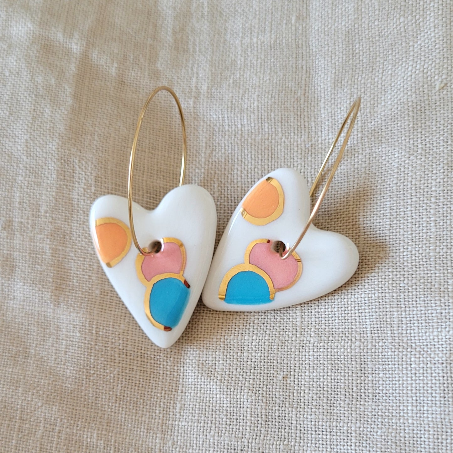 Porcelain dangle earrings with gold "Hearts in orange, pink and blue"
