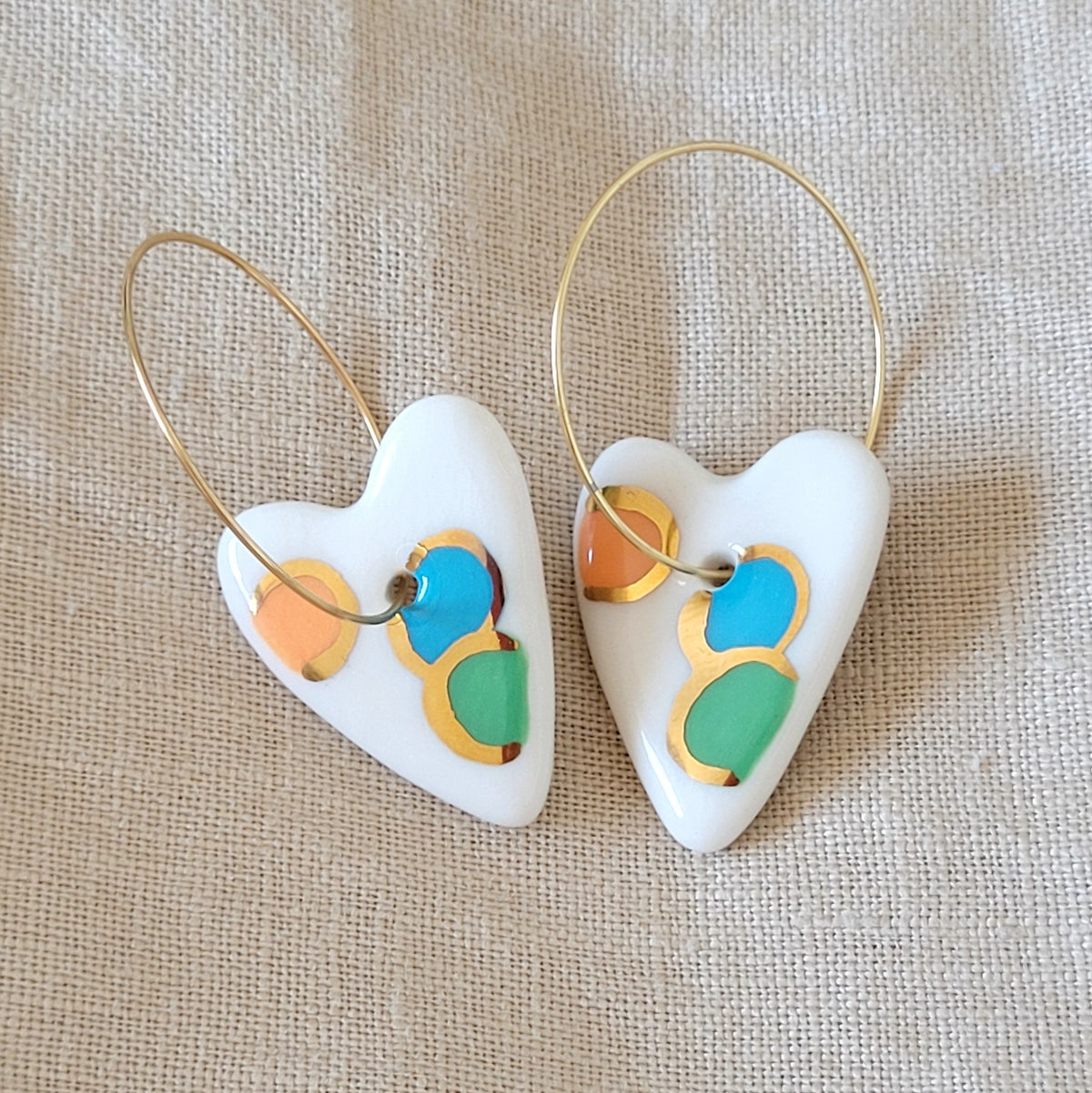 Porcelain dangle earrings with gold "Hearts in orange, blue and green"
