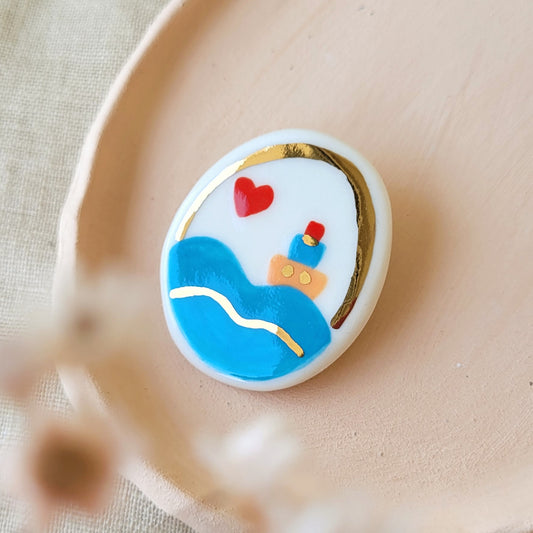 Porcelain brooch with gold "Little boat"