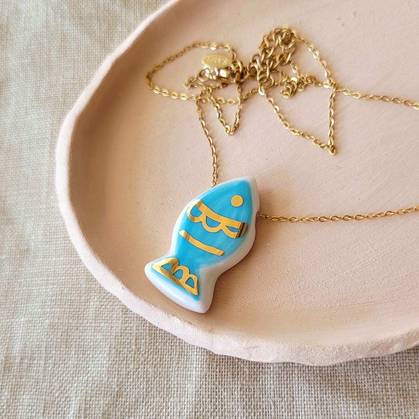 Porcelain necklace with gold "Fish"