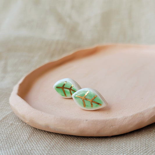 Porcelain stud earrings with gold "Tiny green leaves"