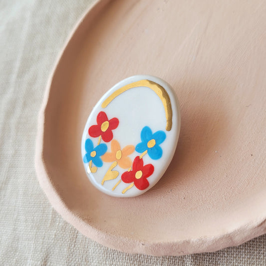 Porcelain brooch with gold "Flowers"