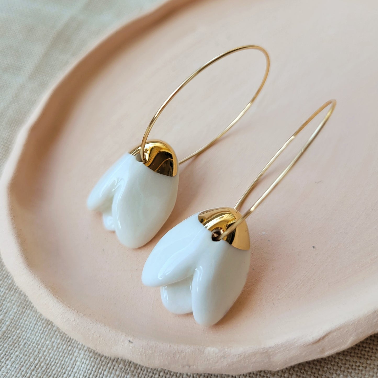 Porcelain dangle earrings with gold "Snowdrops"