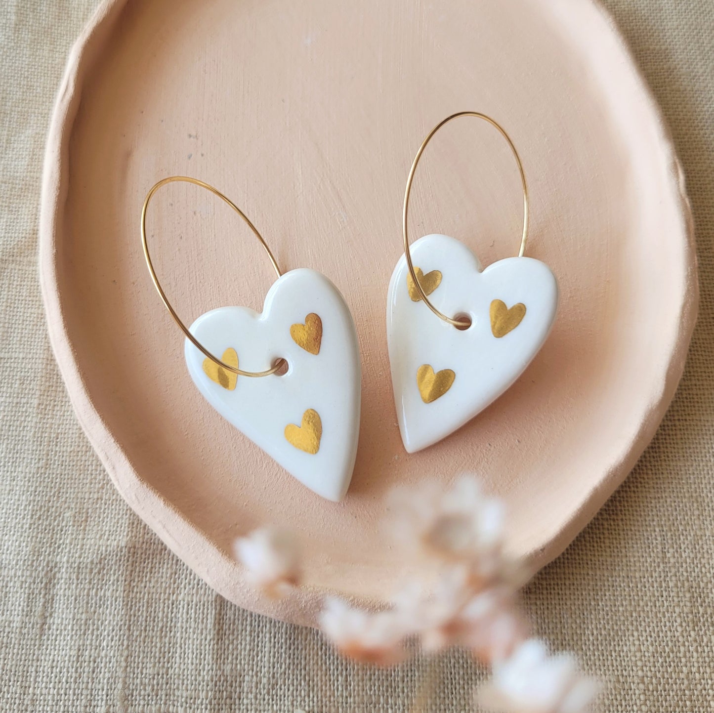 Porcelain dangle earrings with gold "Hearts with hearts"